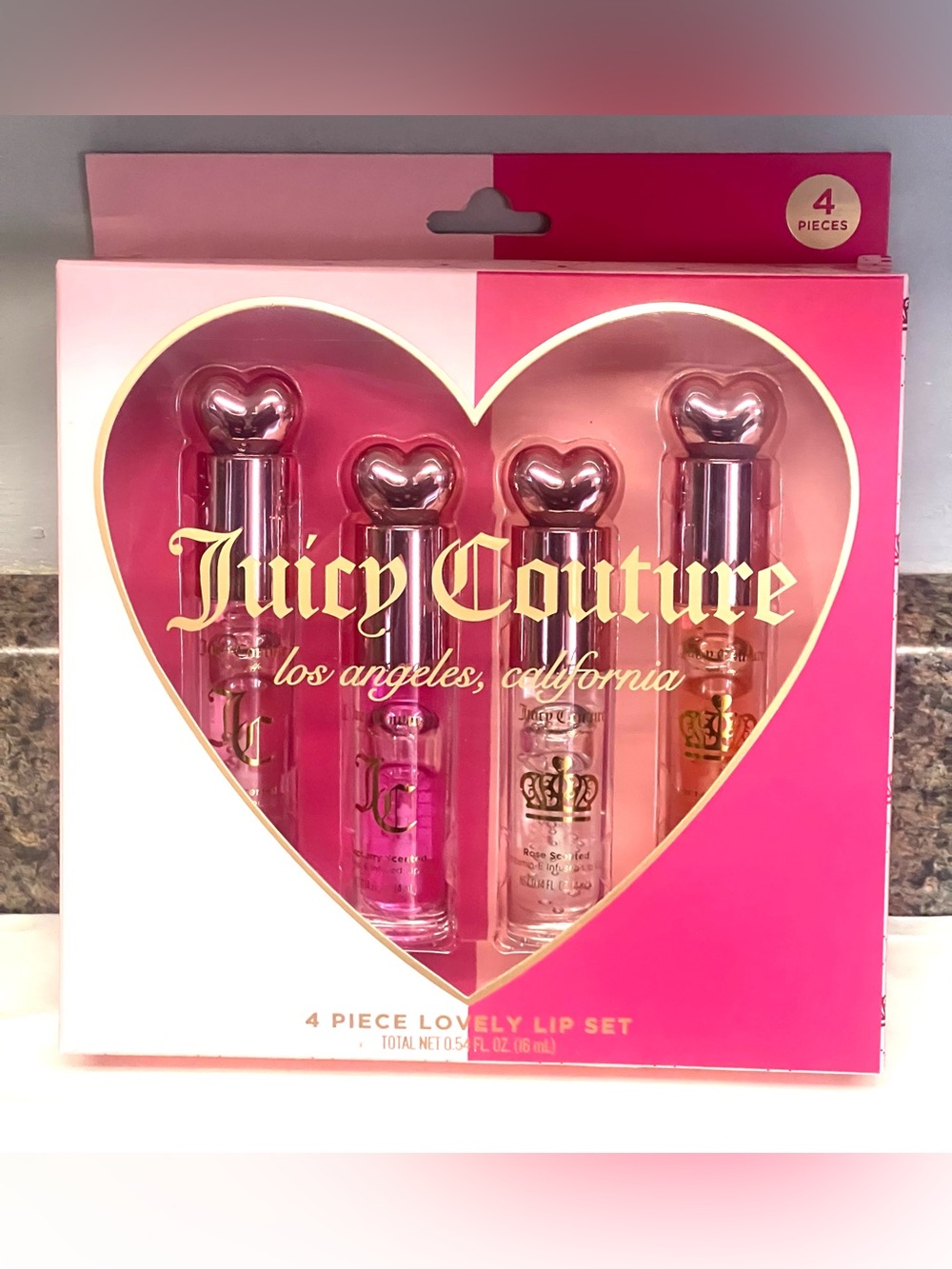 Juicy Couture 4-Piece Lovely Lip set : Cherry/Raspberry/Rose/ Strawberry.